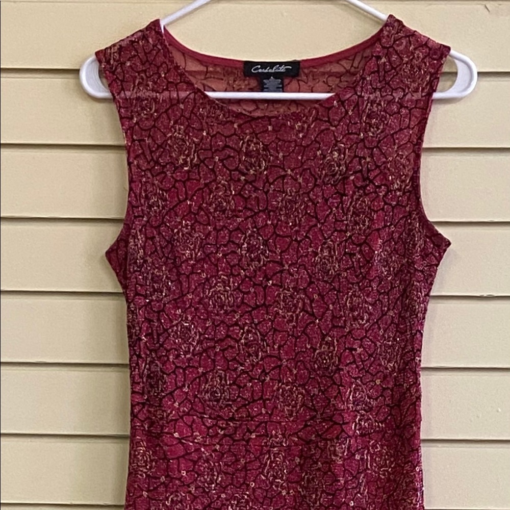 Red formal gown with gold and black rose detail